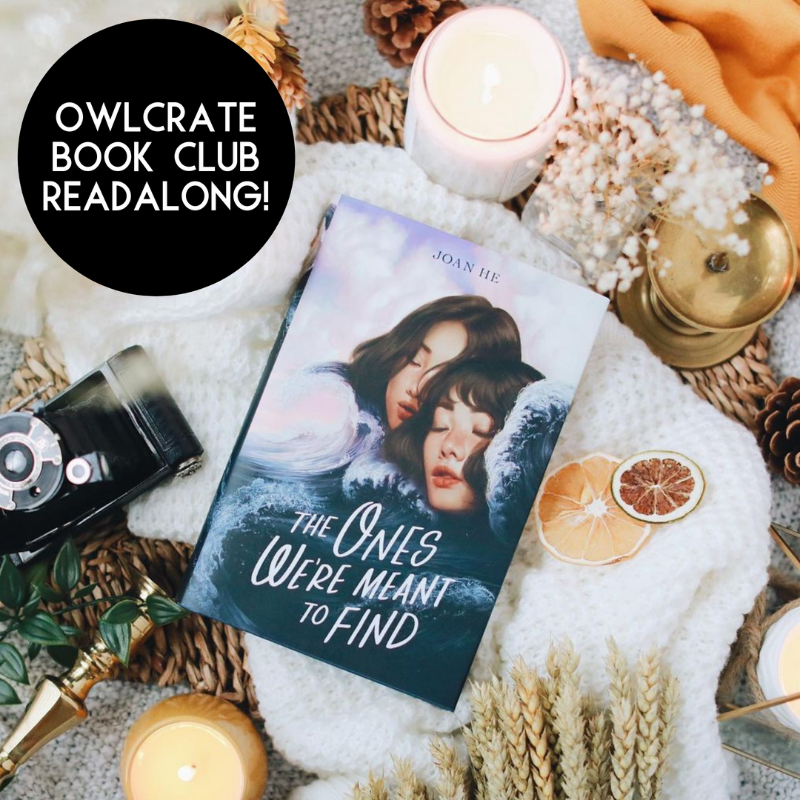 A copy of The Ones We're Meant to Find laying on a white blanket surrounded by plants and candles with the words "OwlCrate Book Club Readalong!" in a black circle