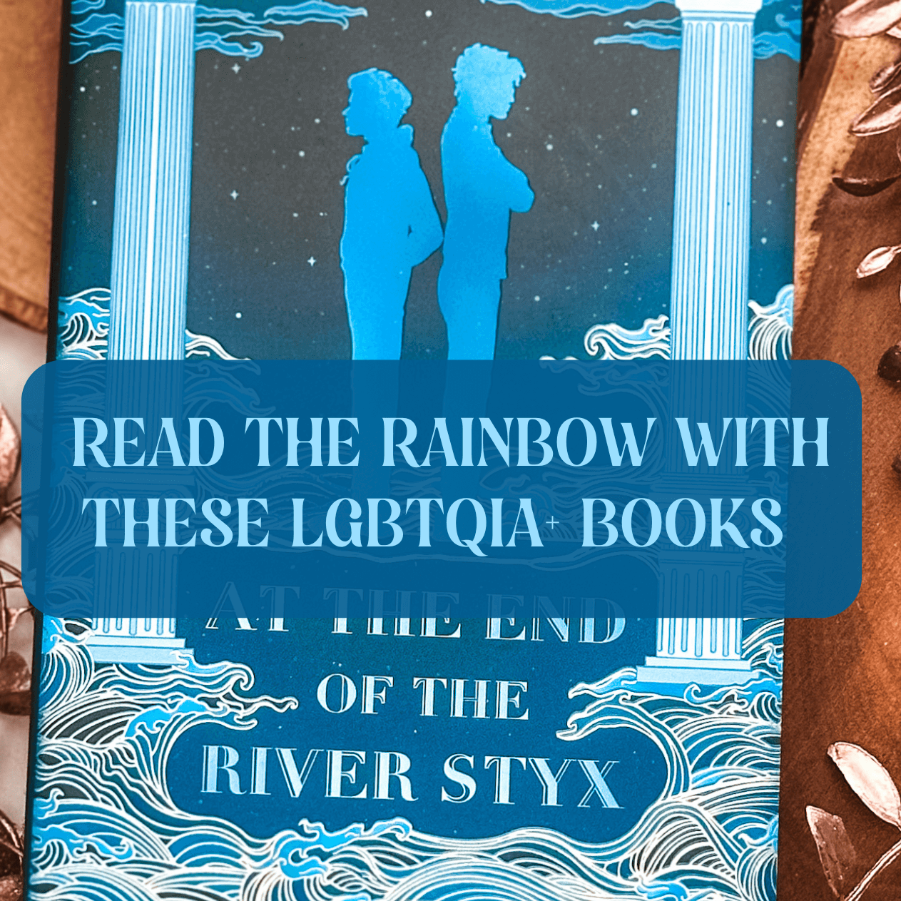 Graphic with blue book and text that says " LGBTQIA+ Books Perfect For Price Month"