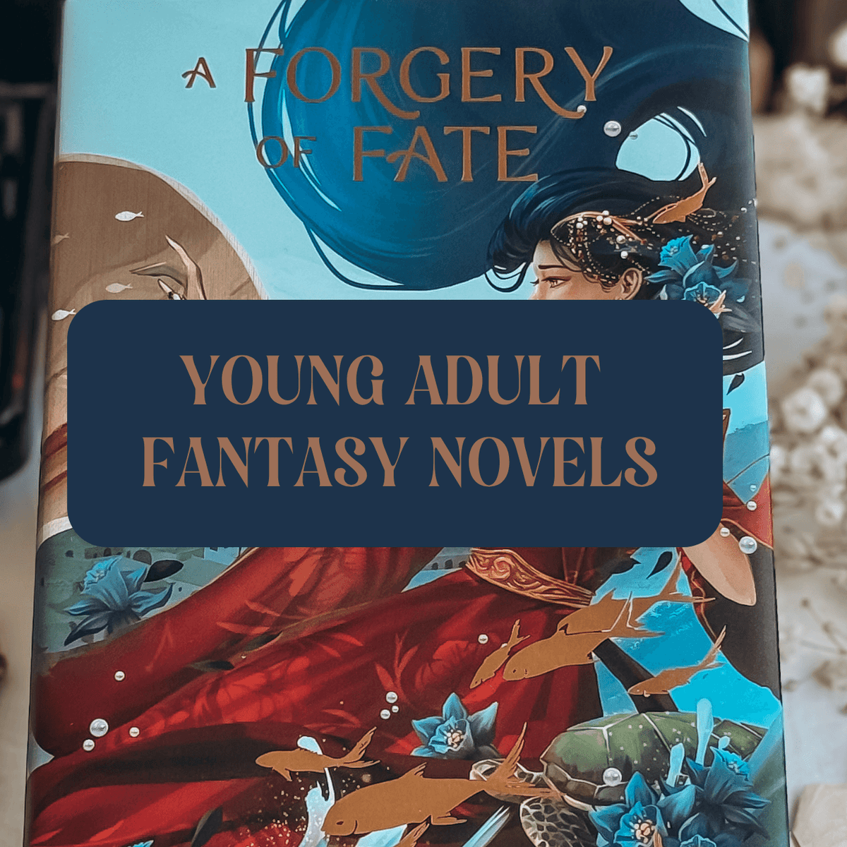 Graphic with photo of book and text which reads "Young Adult Fantasy Novels"