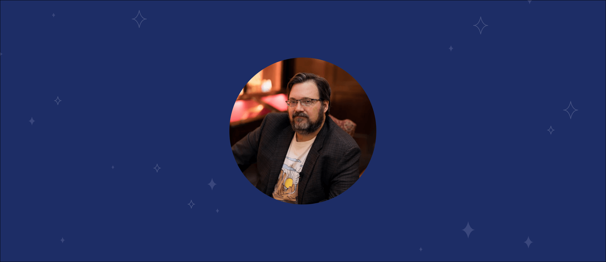 Photo of Brandon Sanderson on navy background