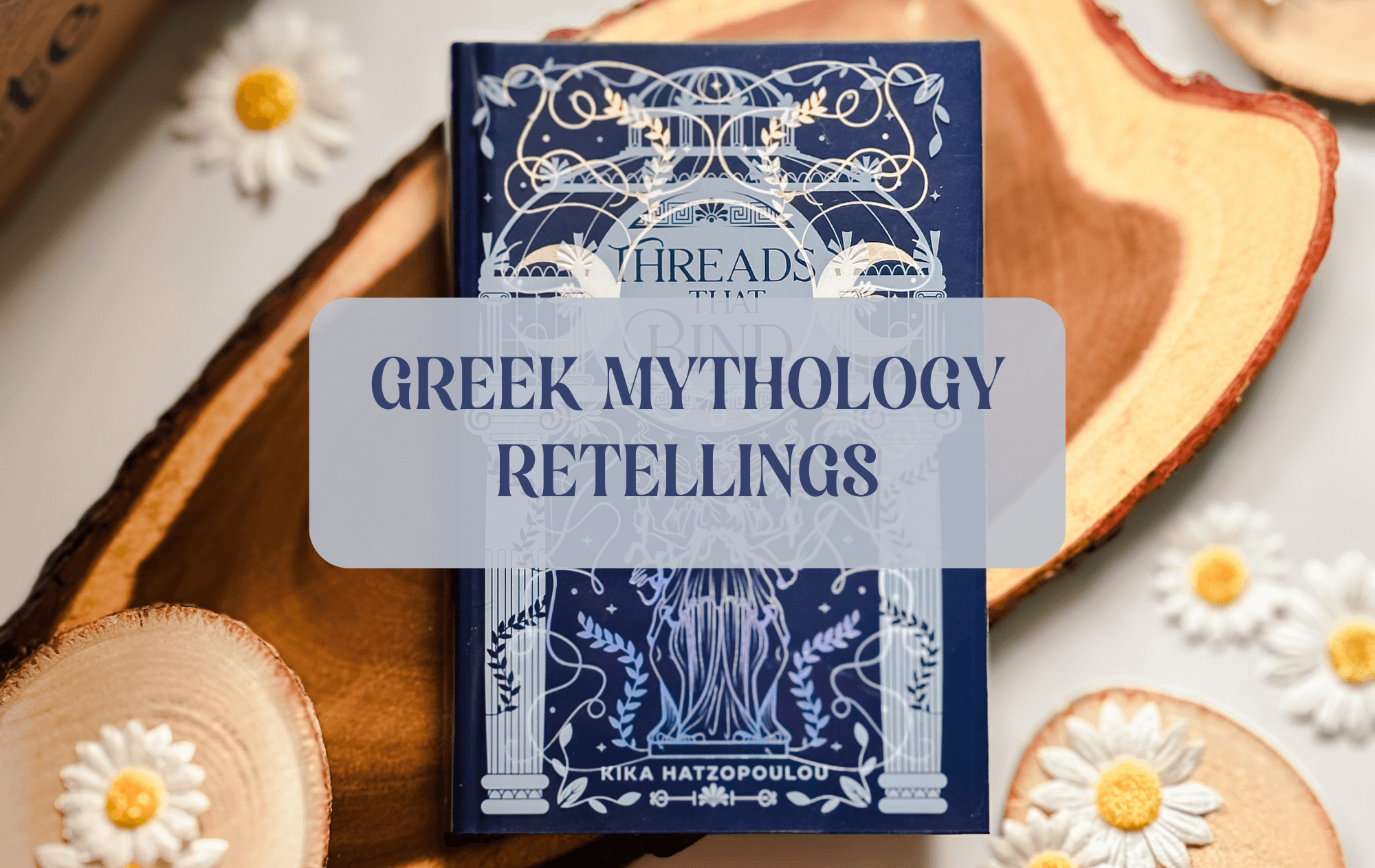 A book in the background with text "Greek Mythology Retellings"