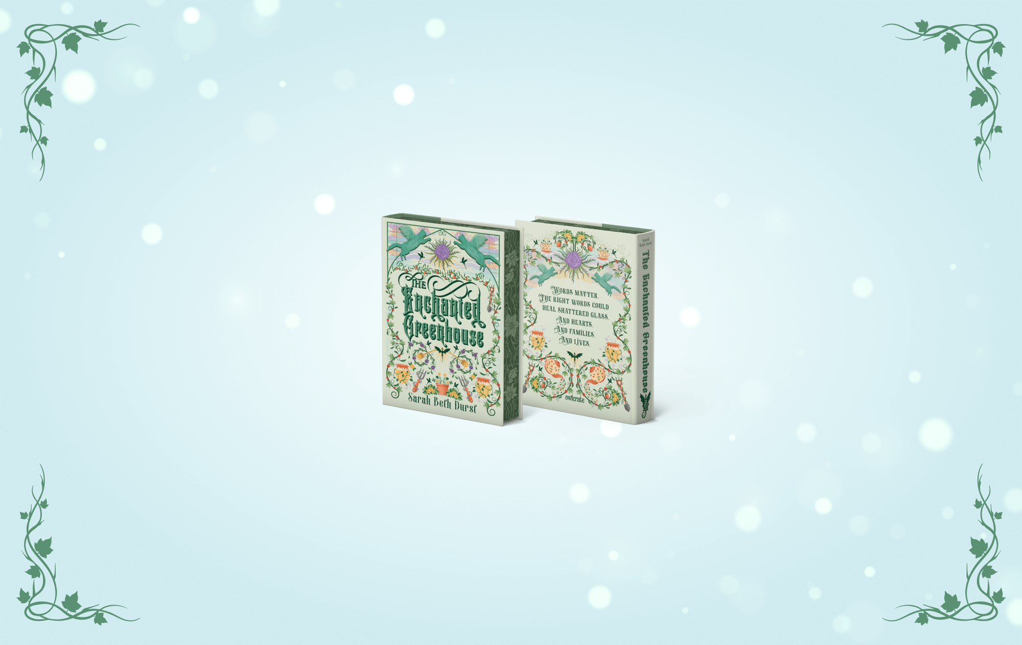 OwlCrate limited edition of The Enchanted Greenhouse. Front and back cover centered on a pale blue background, with ornamental vines framing the borders.