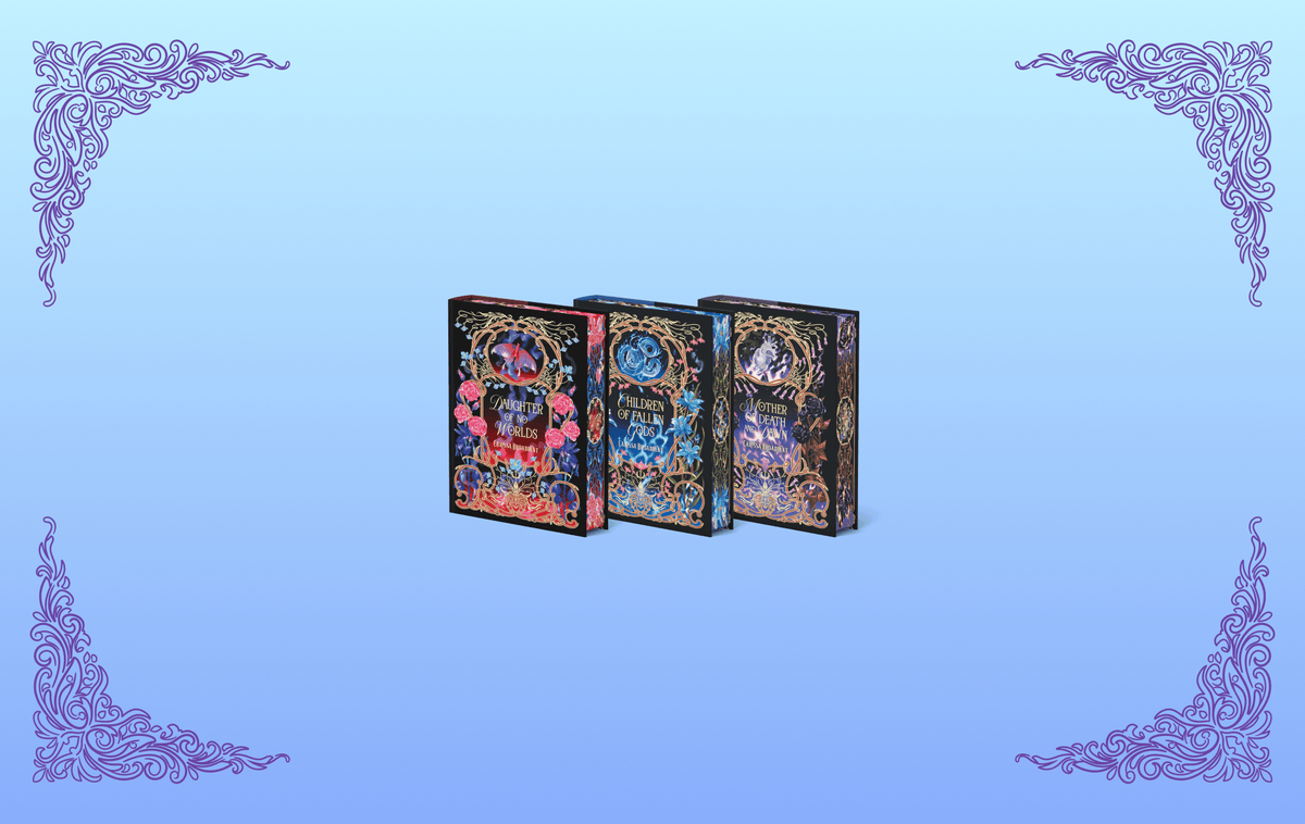 OwlCrate limited editions of The War of Lost Hearts book set trilogy. The front covers of three books are centered on a light blue to darker blue ombre background with purple filigree designs framing the corners.