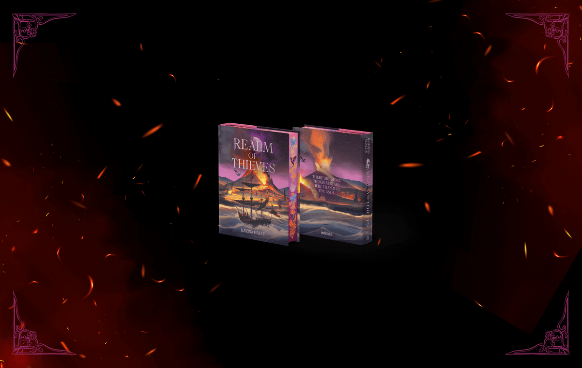 OwlCrate limited edition of Realm of Thieves. The front and back of the book is centered on a black background surrounded by fire embers, with ornamental designs framing the borders.