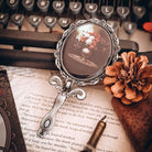 Picture of Dorian Gray folding hand mirror