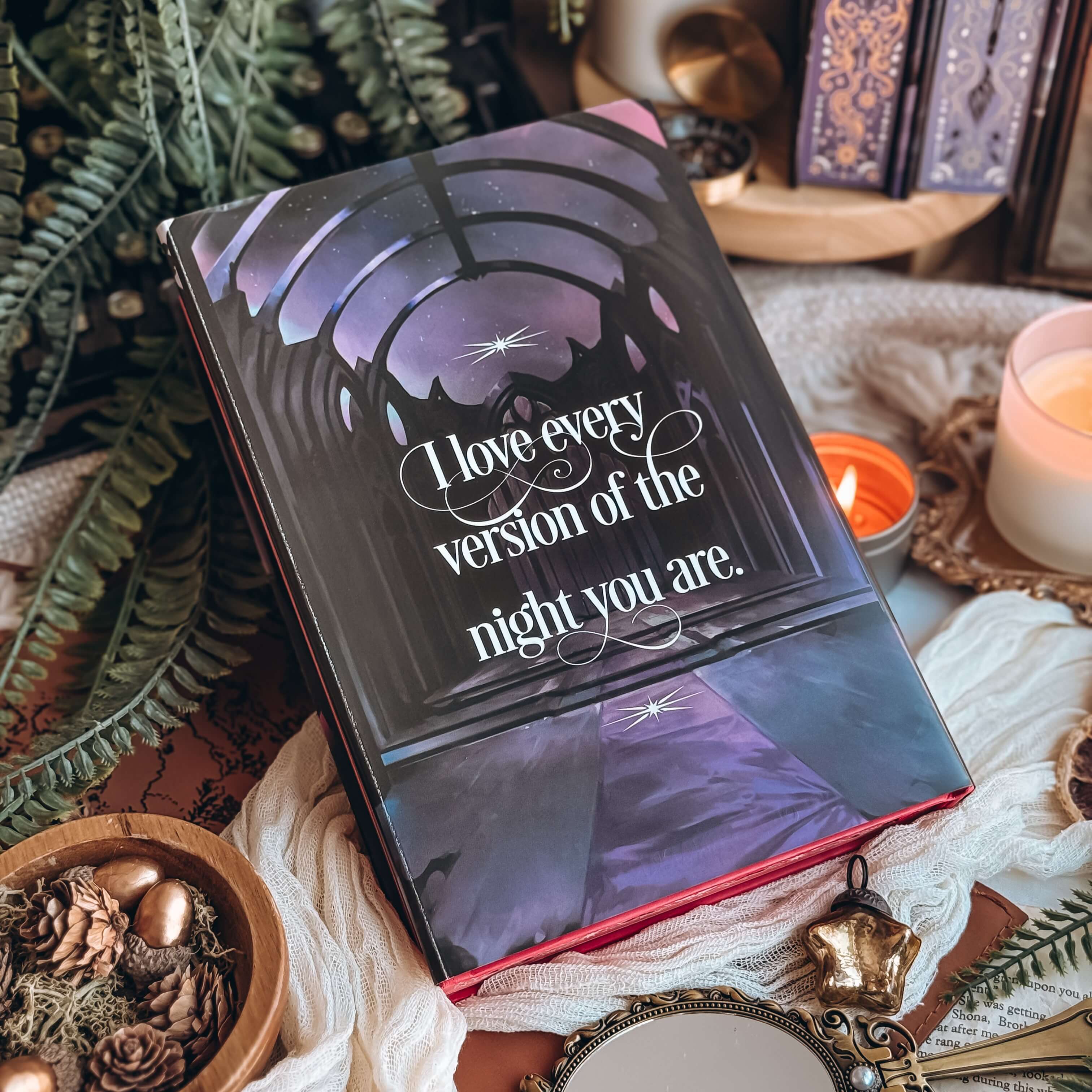 Reversible dust jacket of The Dark is Descending by Chloe C Peñaranda with the text "I love every version of the night you are." Background shows a dark fantasy throne room. 