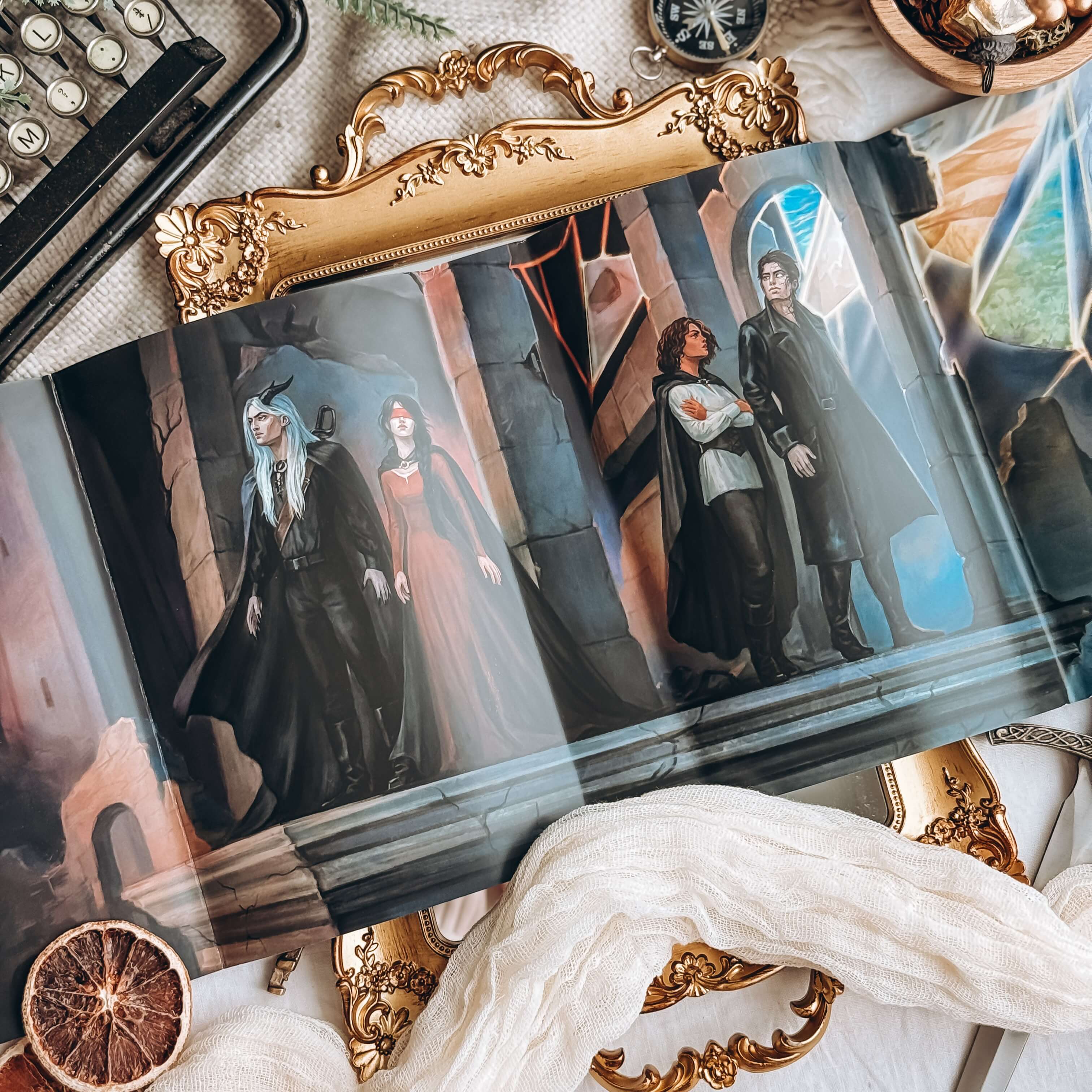 Reversible dust jacket of The Fallen and the Kiss of Dusk by Carissa Broadbent, showing an illustration of two men and two women standing in ruins. 
