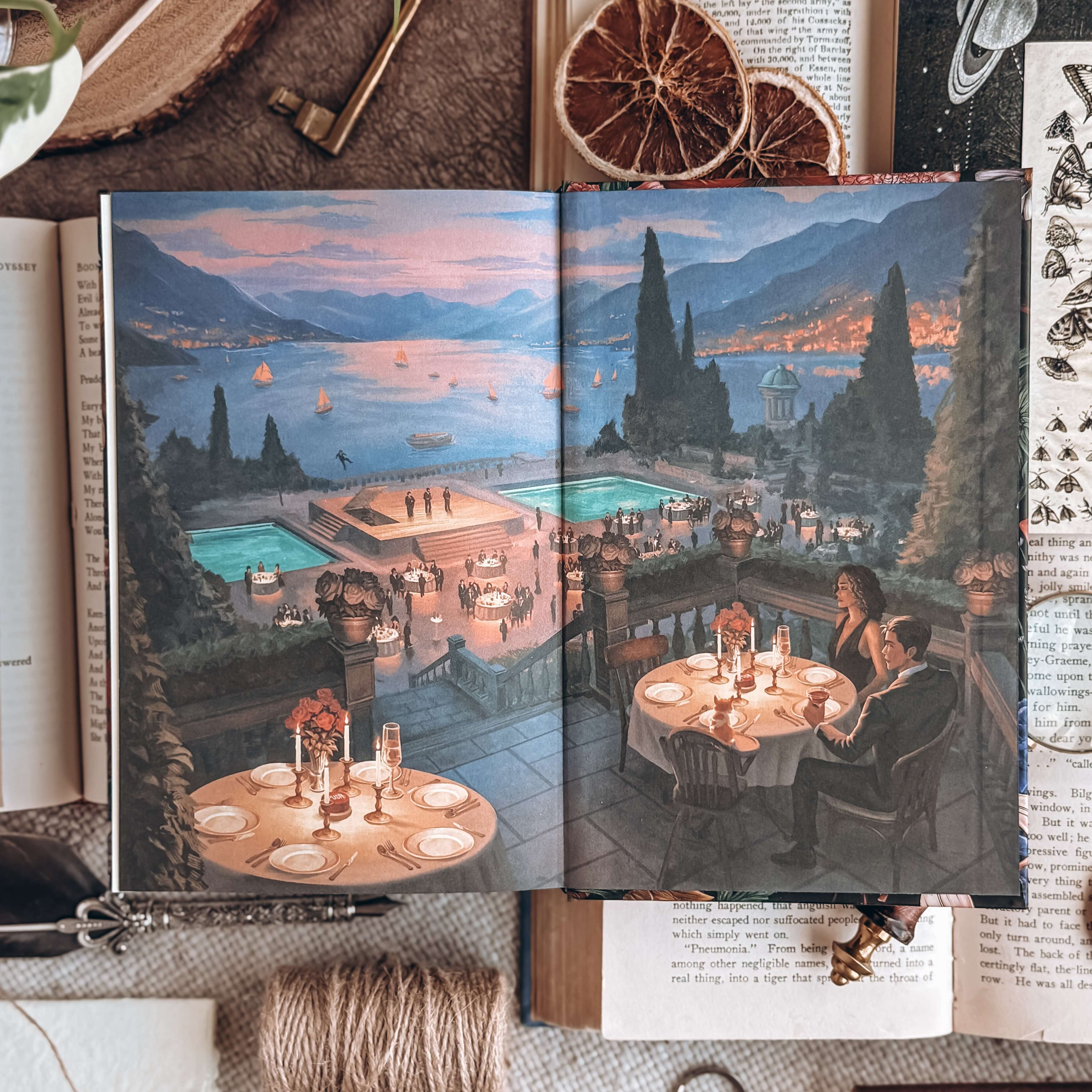 Closing endpaper for Starter Villain by John Scalzi. Illustrated scene hows a man and a women sitting at a candelight table overlooking an idyllic rivera scene at sunset.